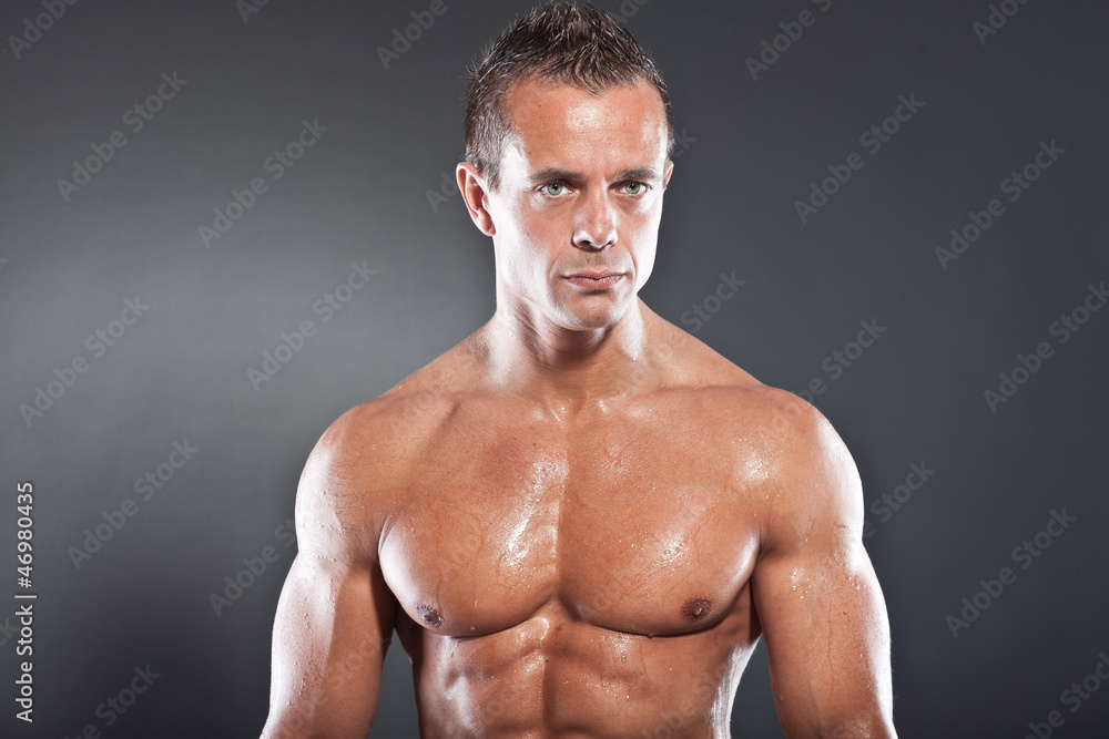 Fototapeta premium Shirtless muscled fitness man. Tough guy. Studio shot.