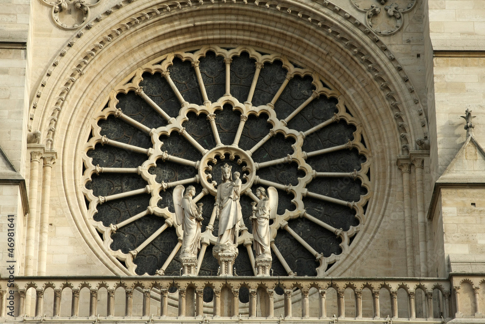 Stained facade window of Notre Dame in Paris, France