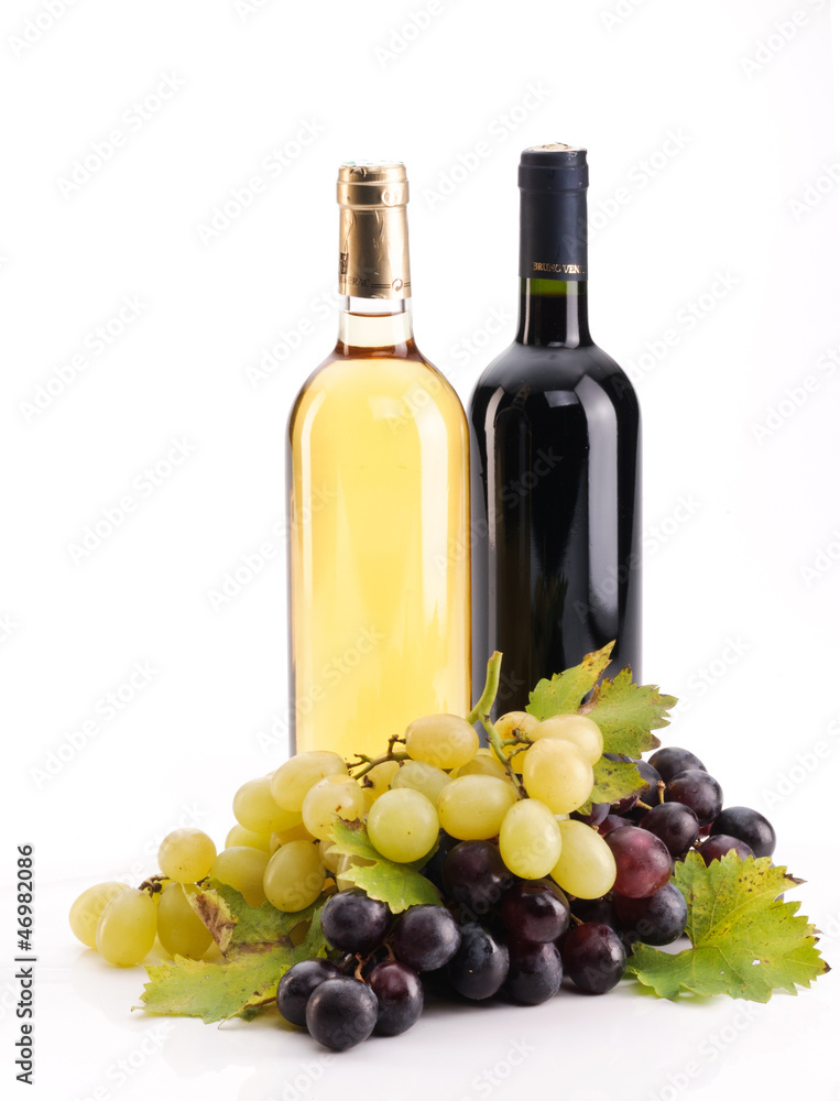 Bottiglie di vino e uva