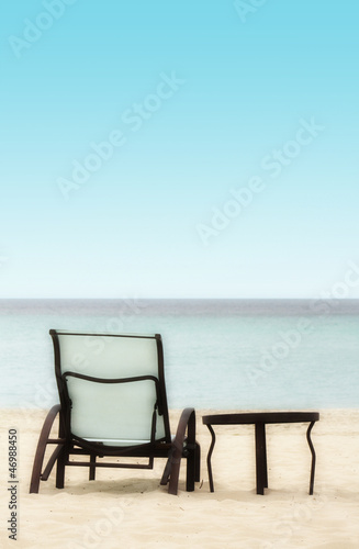 Chair and Table on the Beach