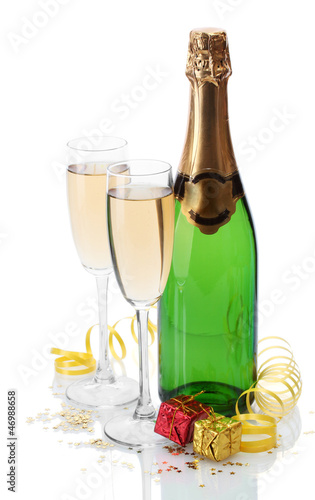 glasses and bottle of champagne, gifts and serpentine isolated