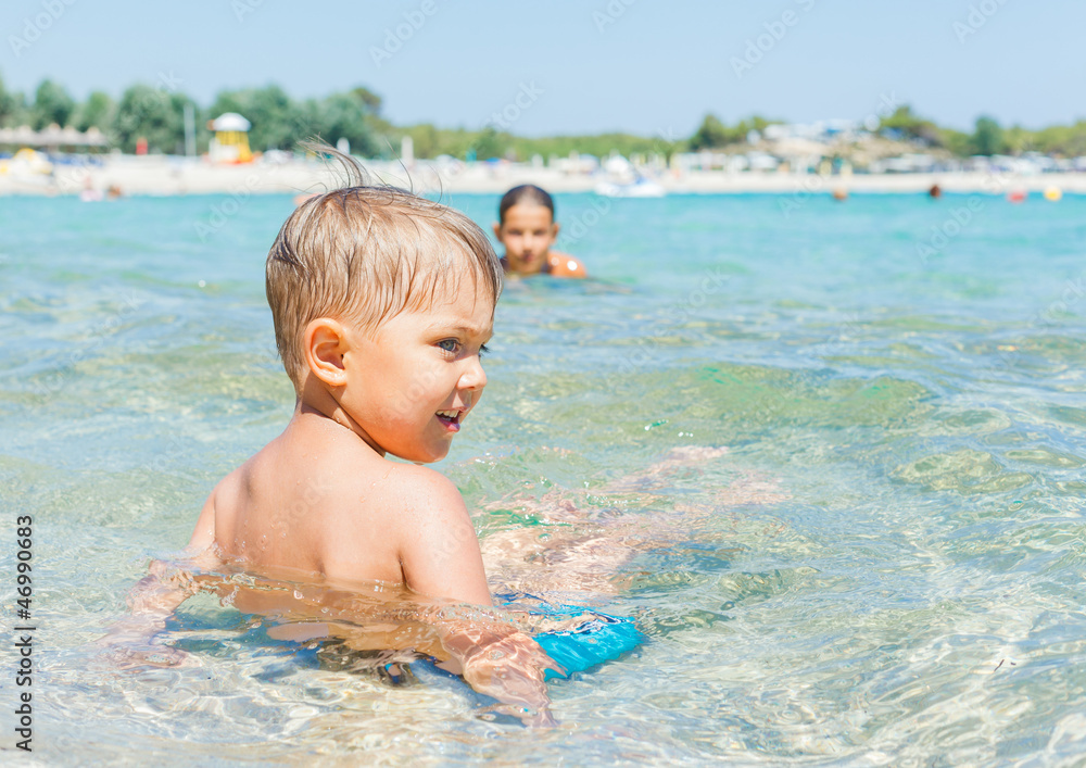 Kids playing in the sea