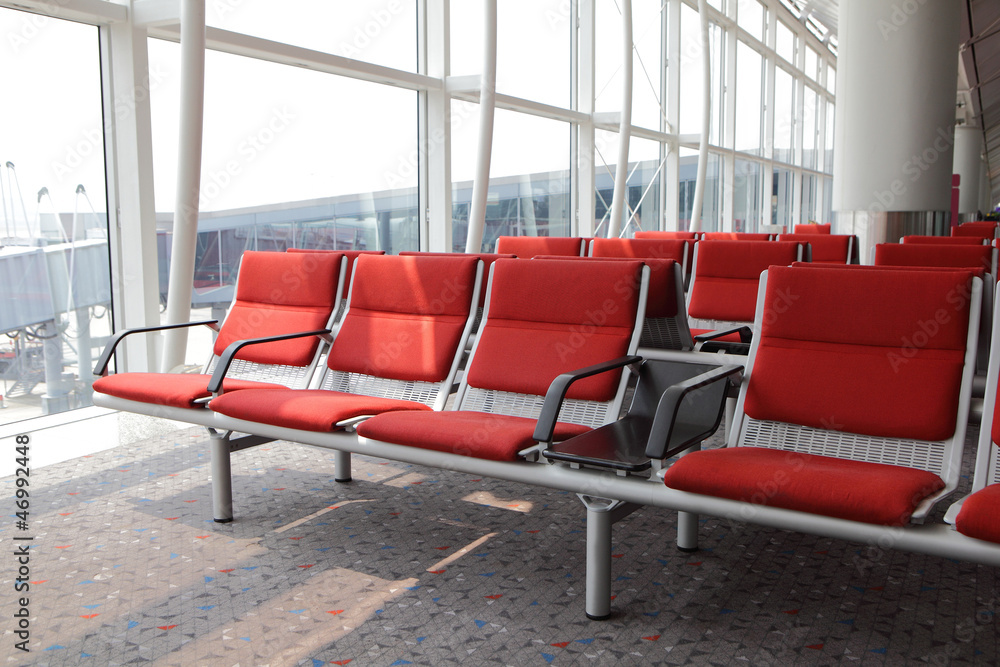 Fototapeta premium red chair at airport