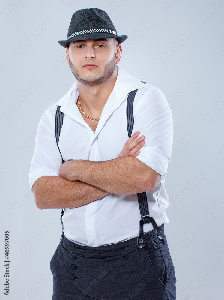 Portrait of handsome man posing on white background