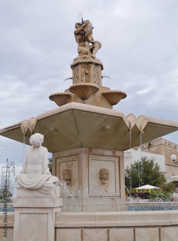 The monumental fountain in Mola di Bari in Apulia in Italy