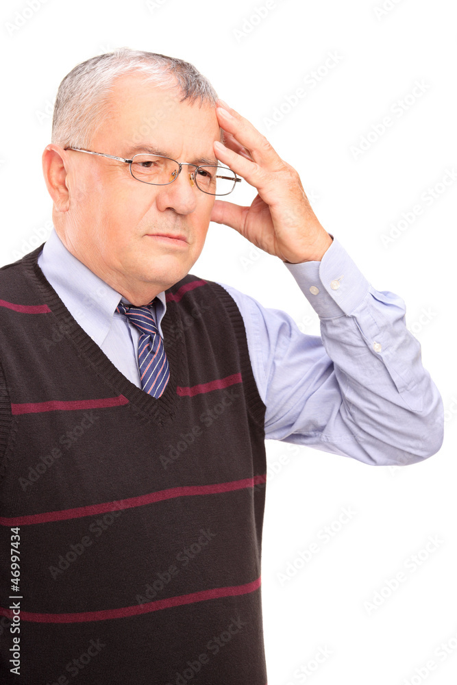 Portrait of a mature man holding his head Portrait of a mature man holding his head