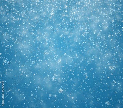New Year's winter background with falling snowflakes and stars