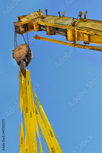 Construction crane against blue sky 