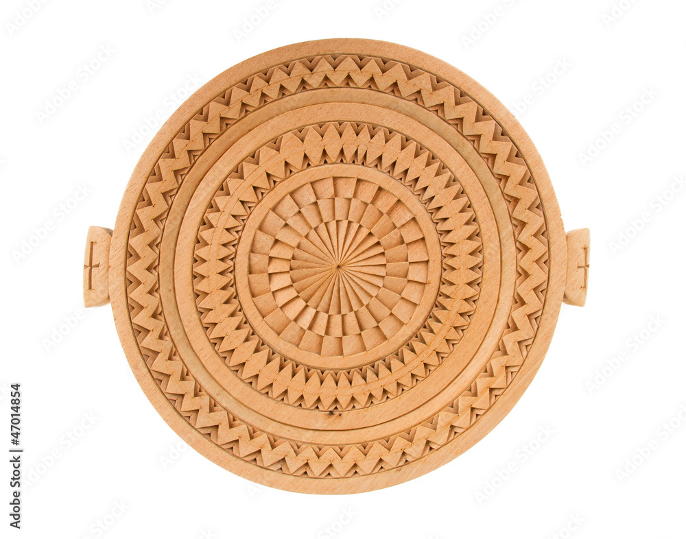Fototapeta premium Wooden plate, carving from Suriname