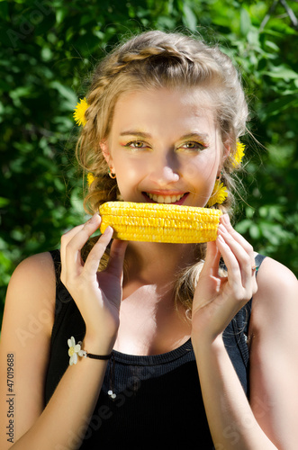 woman eating corn-cob