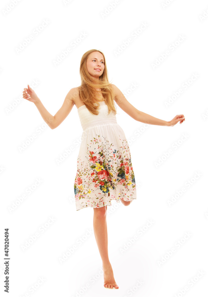 A full-length portrait of a pretty young girl