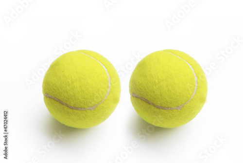 two yellow tennis balls © panphai
