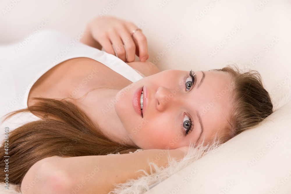 Sensuality woman lying on a sofa Sensuality woman lying on a sofa