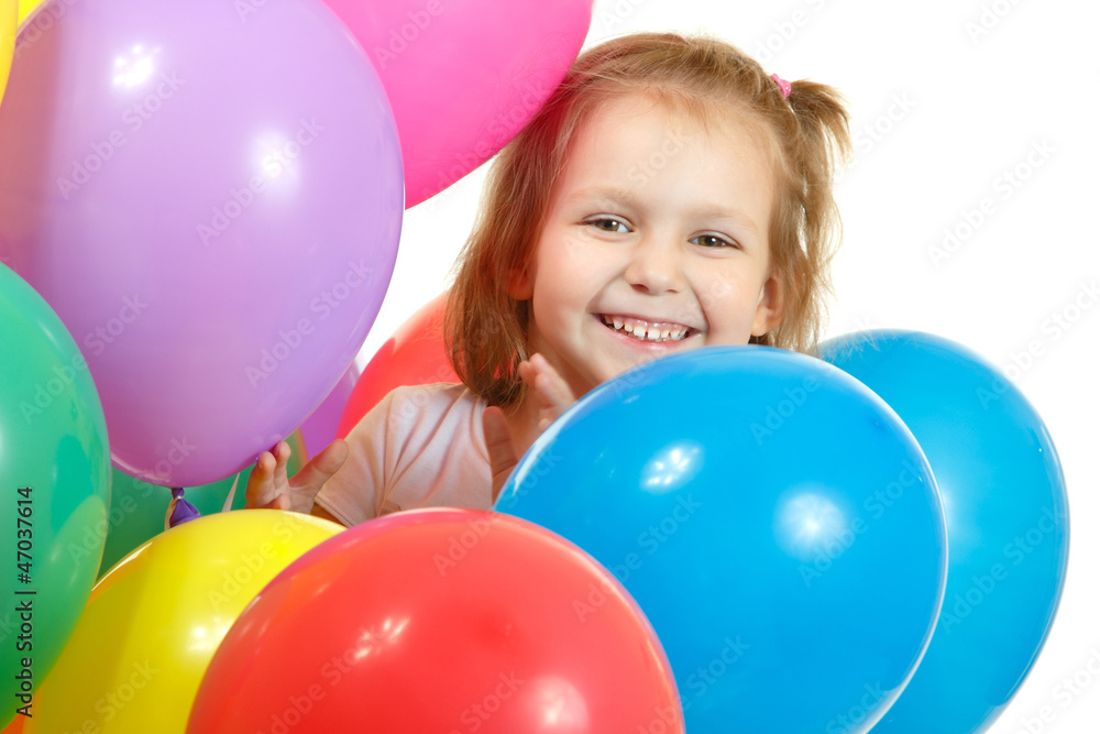 Obraz premium Happy little girl with color balloon isolated on white