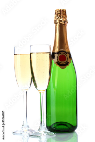 glasses and bottle of champagne isolated on a white