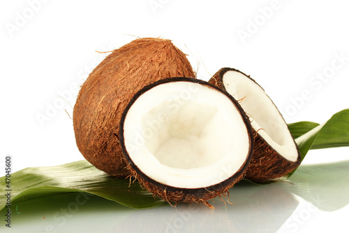 coconuts with green leaf on white background close-up