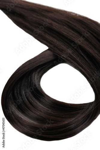 Curly brown hair close-up isolated on white