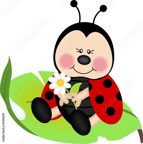Ladybug sitting on a green leaf