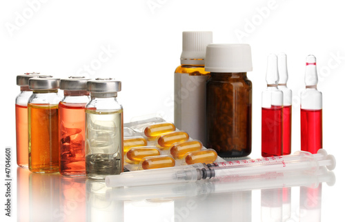 medical ampules, bottles, pills and syringes, isolated on white