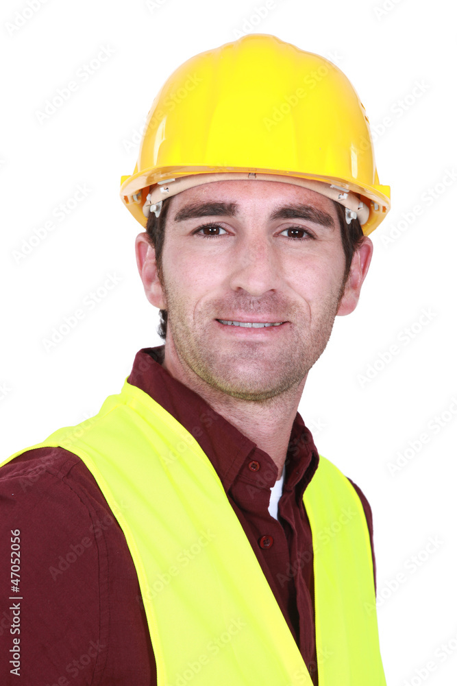 Builder wearing high-vis vest Builder wearing high-vis vest