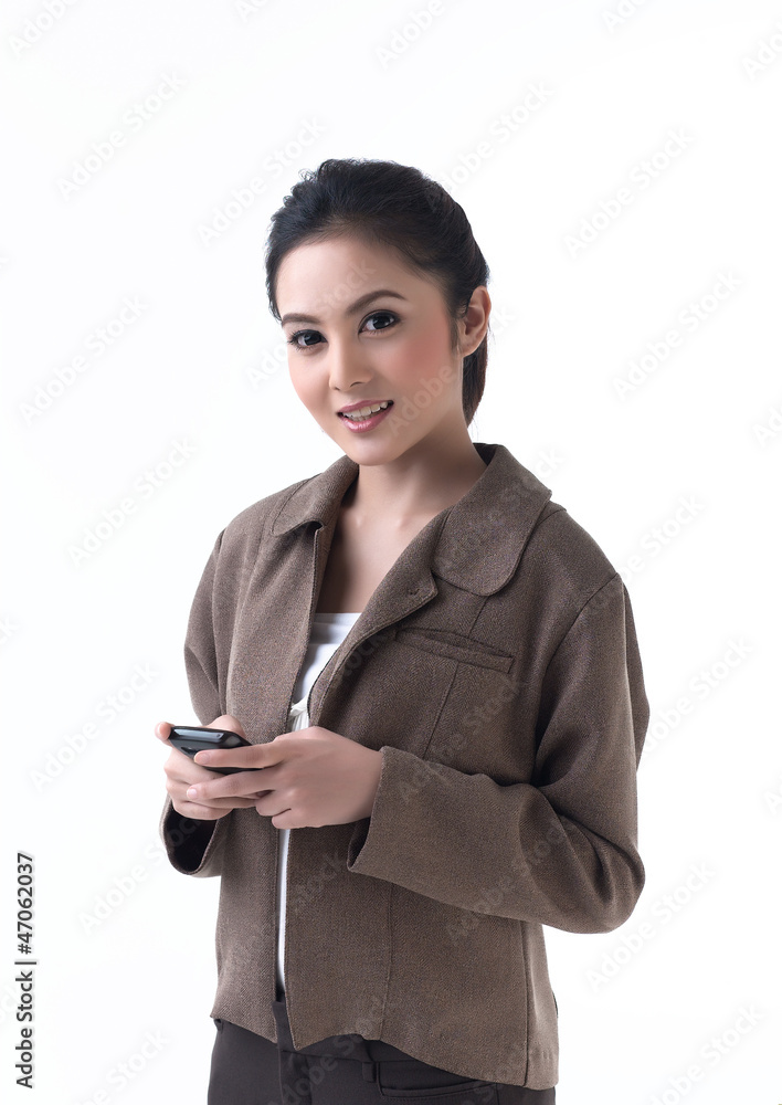 Pretty business woman holding the phone