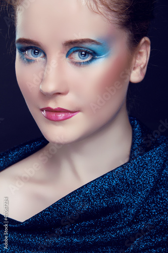 Beauty woman portrait of teen girl with eyes make up, fashion st