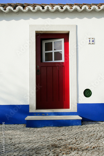 Colored door in Porto Covo, Portugal photo