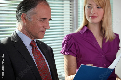 senior businessman reading a report