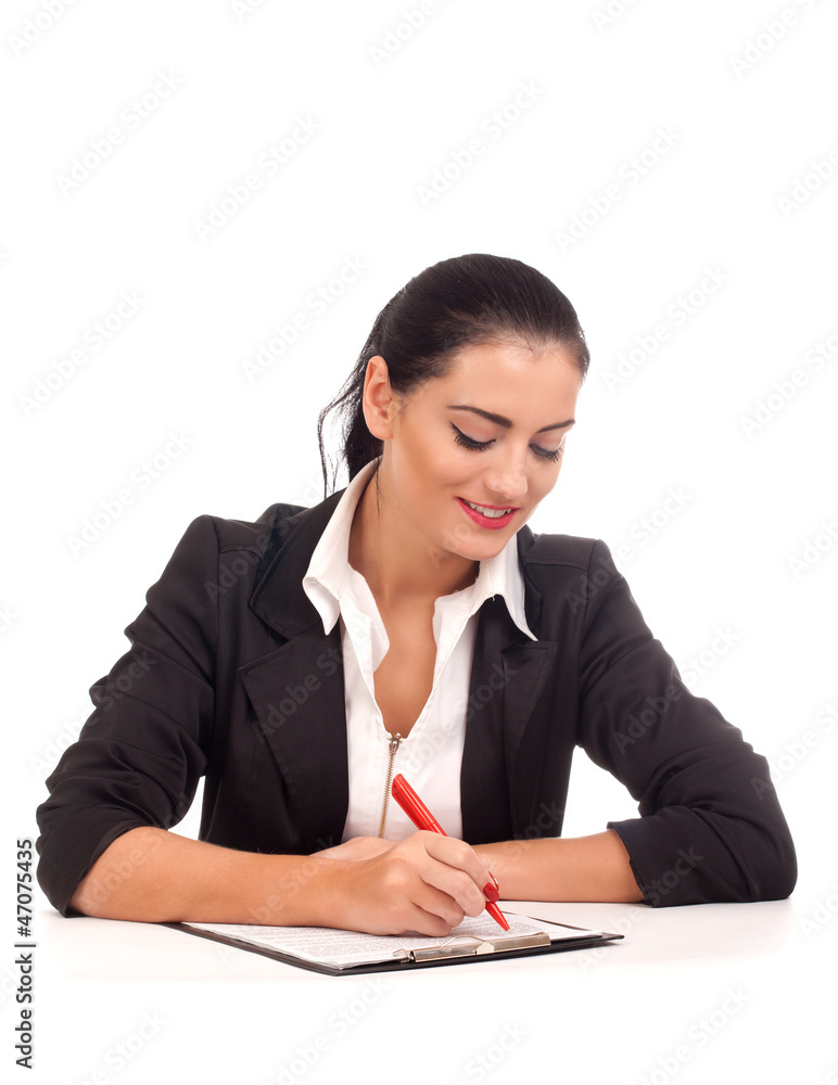 Portrait of business woman signing documents Portrait of business woman signing documents