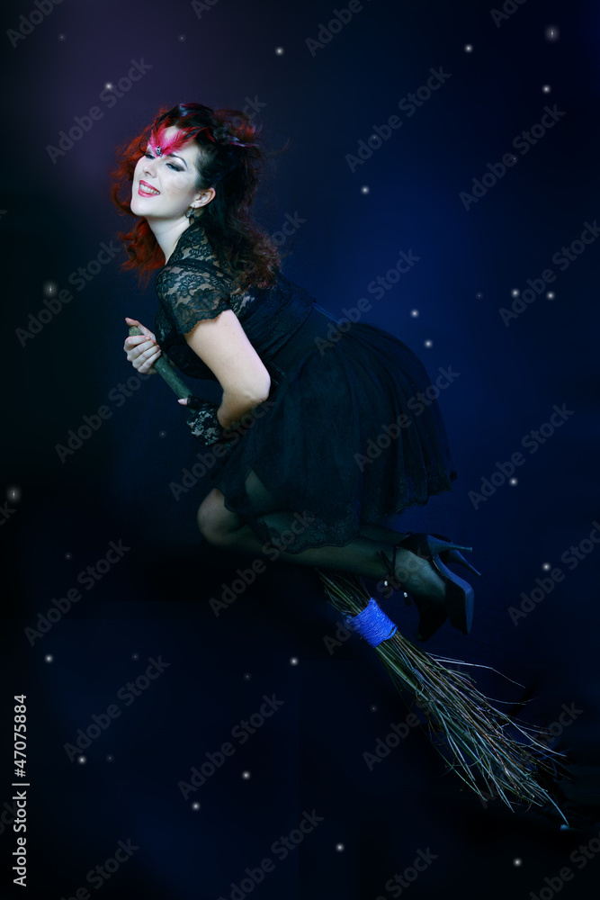 brunette witch flying on broom
