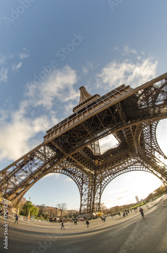 Upward fisheye view of Eiffel Tower in Paris