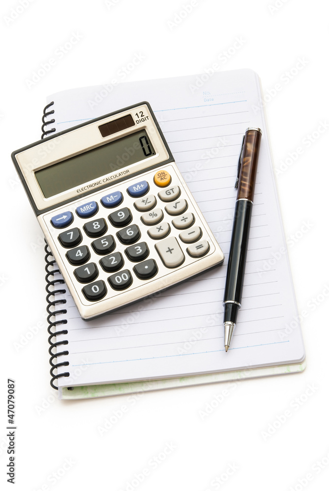 calculator and pen on note book with clipping path calculator and pen on note book with clipping path