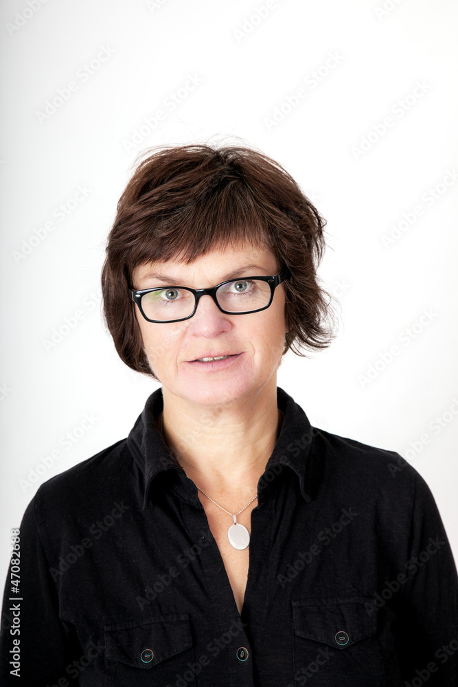Woman with glasses in middle age
