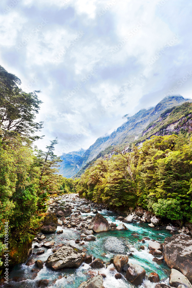 Obraz premium Floating river in the mountain valley