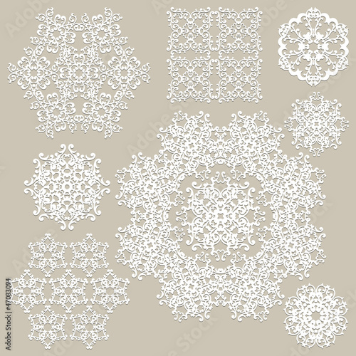 Vector Highly Detailed Paper Cut Snowflakes photo