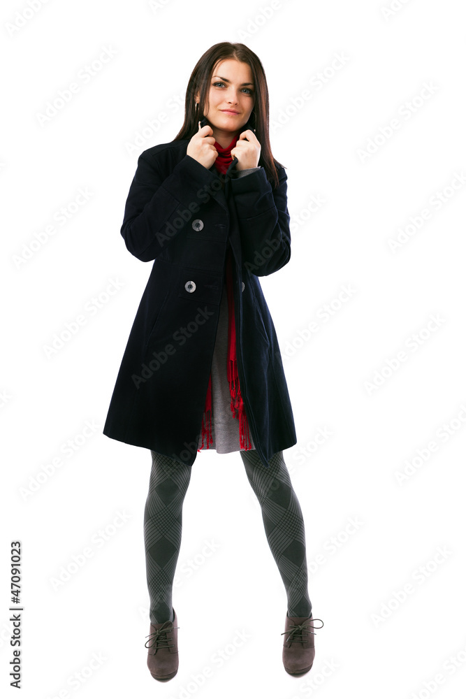 Young woman wearing black coat isolated on white background