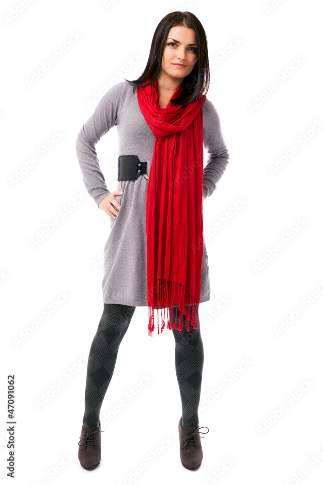 Young woman standing with hands on hips