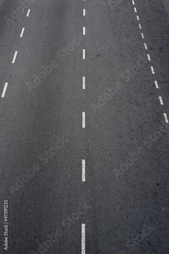 Asphalt road with white lines