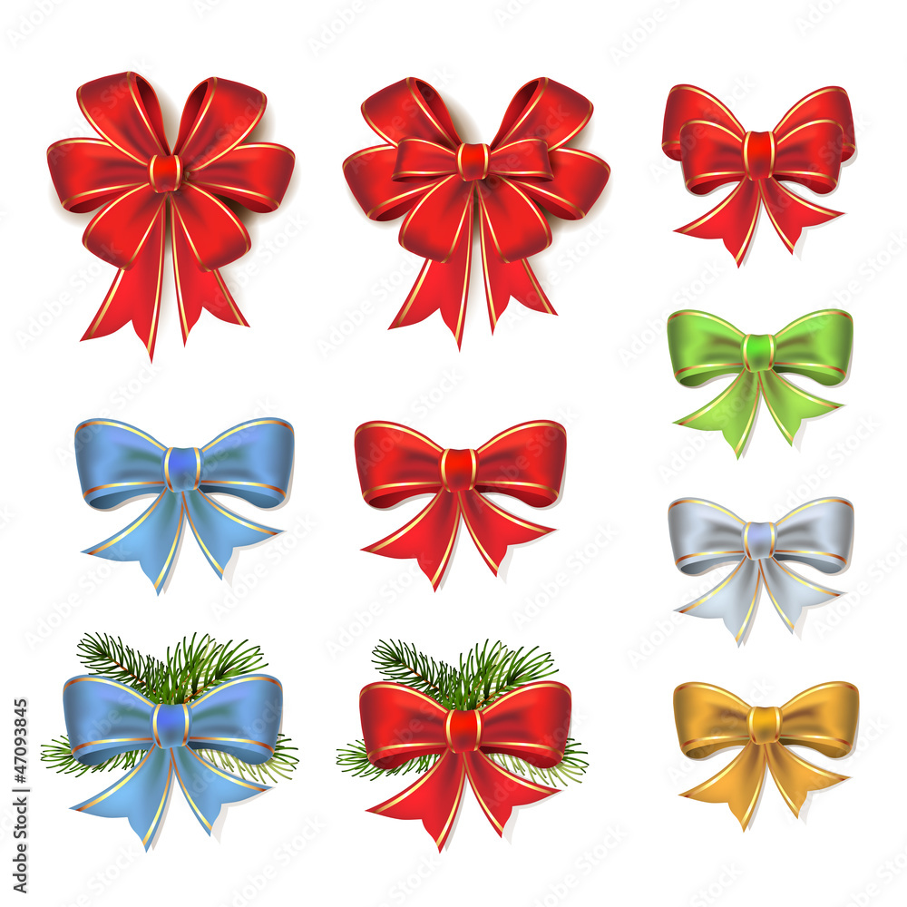 Christmas bows in different colors on white