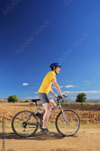 Biker in yellow shirt riding a bike, Macedonia