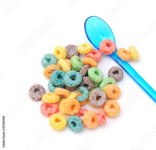 colorful cereal and plastic spoon