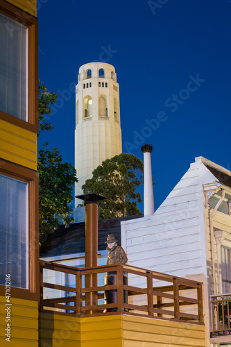 Photography Coit Tower and man sculpture at night in San Francisco