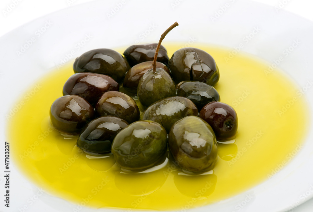 Freshly Harvested Olives with Olive oil Freshly Harvested Olives with Olive oil