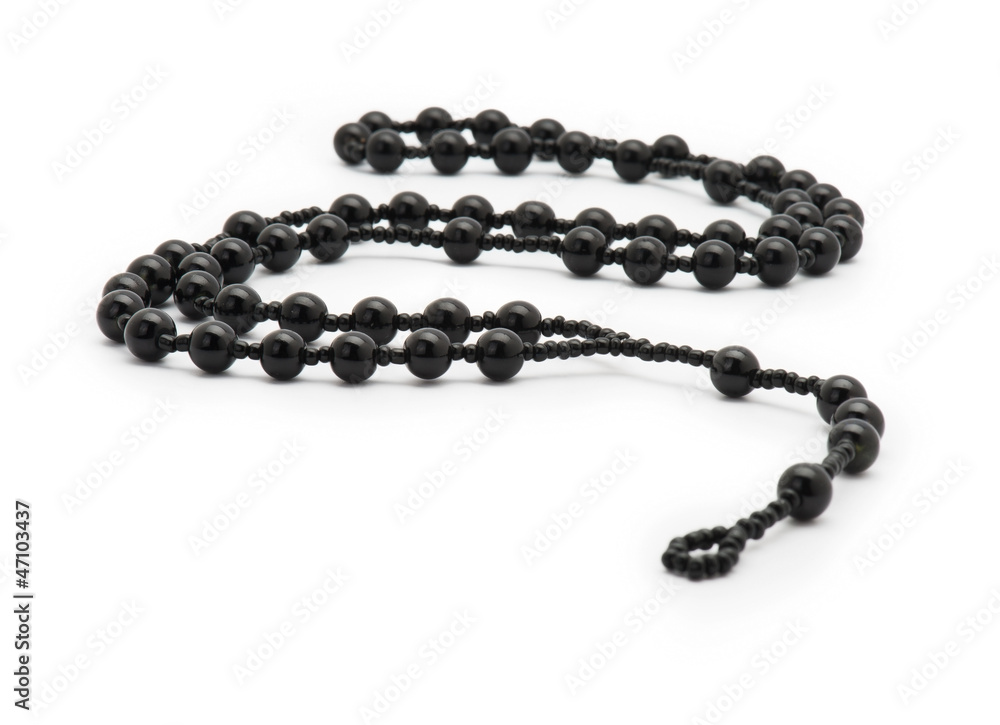 Black rosary isolated on white Black rosary isolated on white