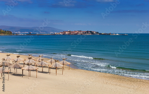 Empty south beach with tents in Nessebar