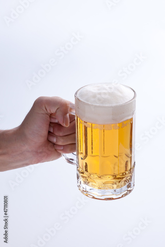 beer poured into a jug