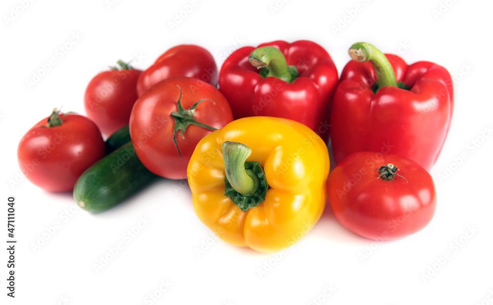 paprika, tomatoes and cucumber isolated on white paprika, tomatoes and cucumber isolated on white