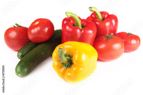 paprika, tomatoes and cucumber isolated on white