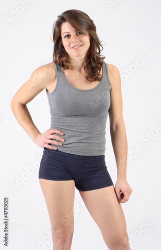 Portrait of a healthy fitness woman with shorts and singlet