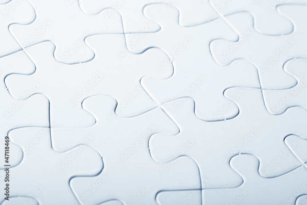 Jigsaw puzzle with blank white pieces Jigsaw puzzle with blank white pieces